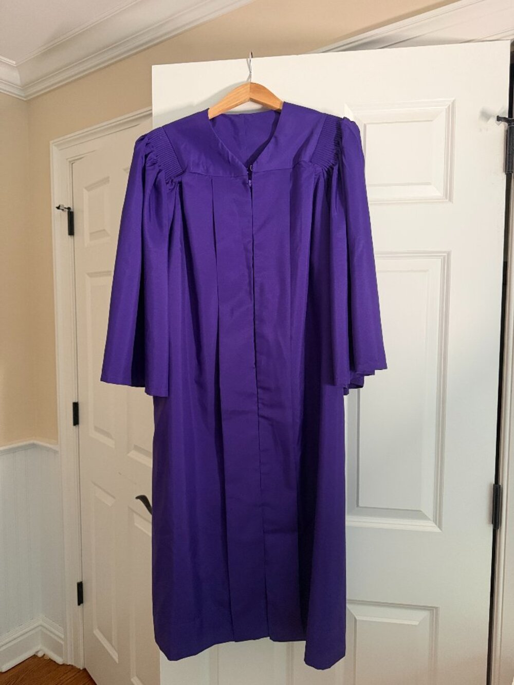 Purple graduation gown + Black cap + Purple tassel